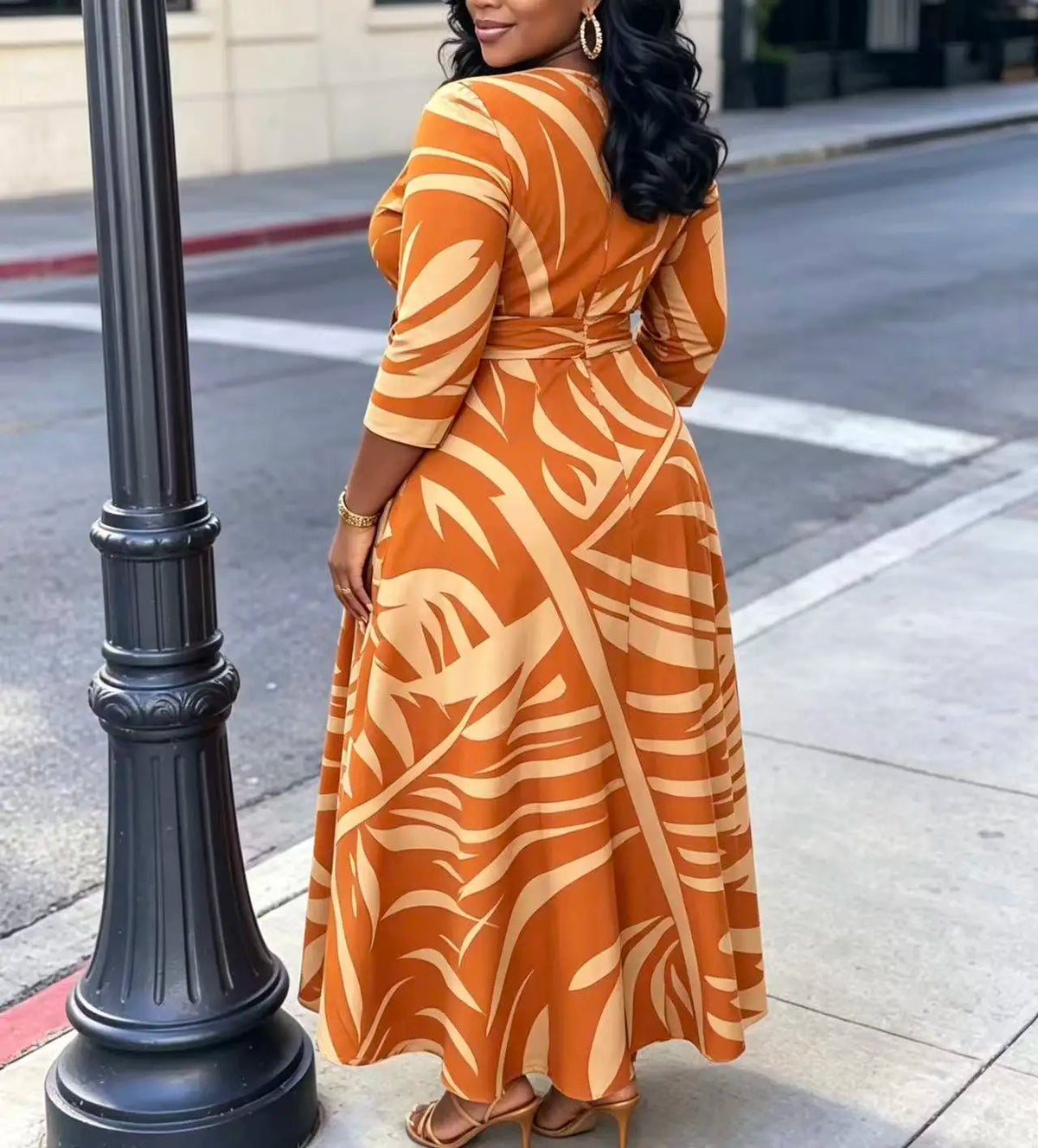 Plus size women's orange palm leaf print plus size midi dress round neck three-quarter sleeves waist tie cinched waist flared hem pockets vacation maxi