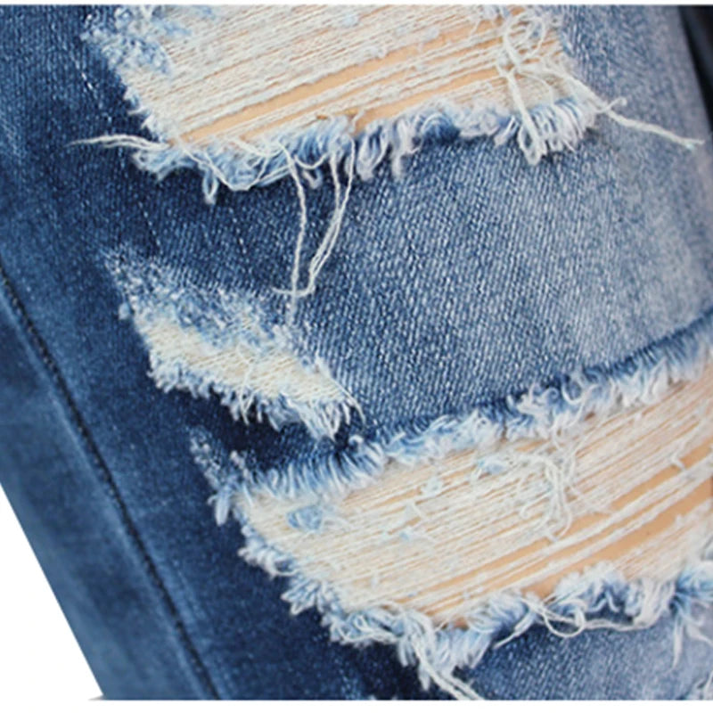 Distressed Skinny Jeans in Washed Blue