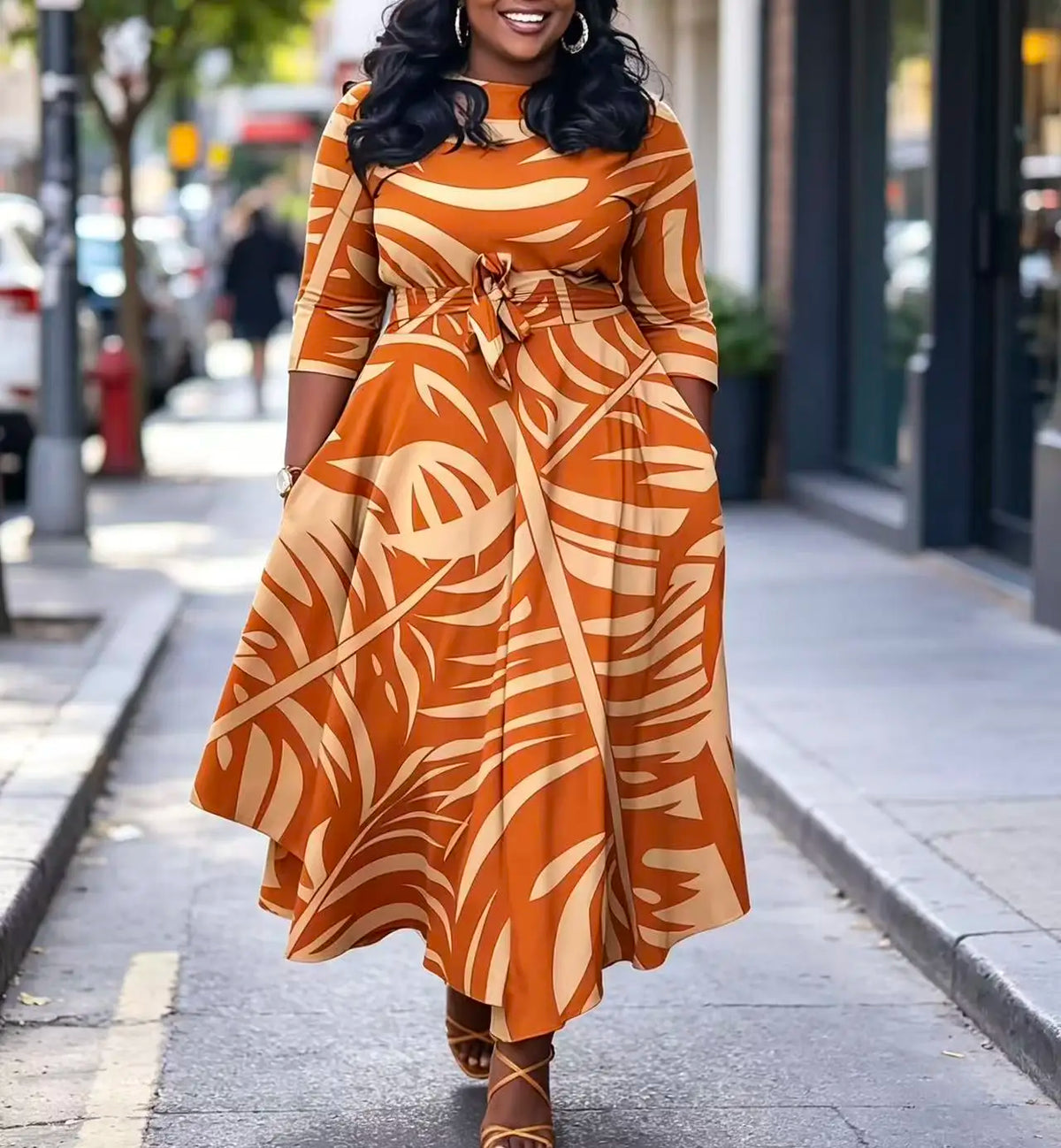 Plus size women's orange palm leaf print plus size midi dress round neck three-quarter sleeves waist tie cinched waist flared hem pockets vacation maxi