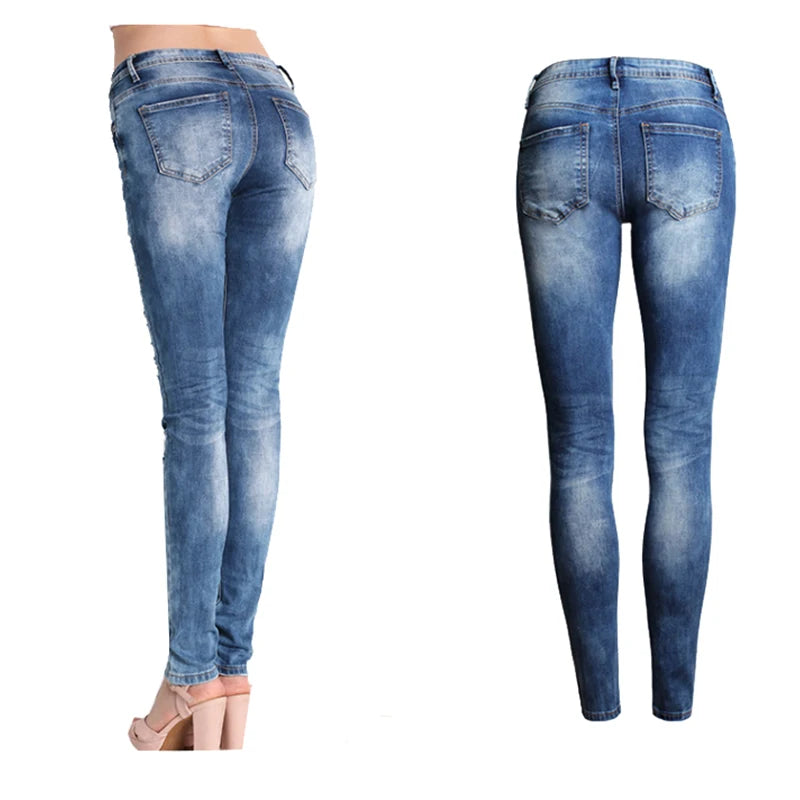 Distressed Skinny Jeans in Washed Blue
