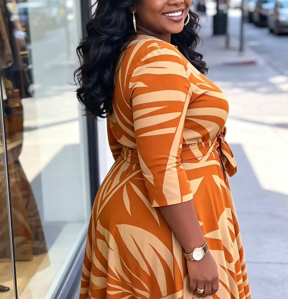 Plus size women's orange palm leaf print plus size midi dress round neck three-quarter sleeves waist tie cinched waist flared hem pockets vacation maxi