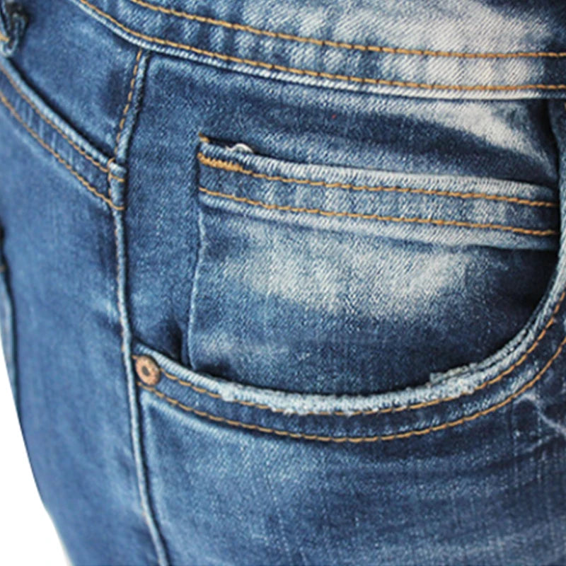 Distressed Skinny Jeans in Washed Blue